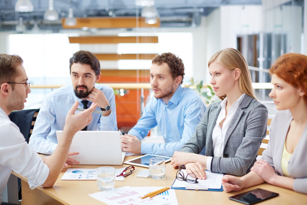 5 people in business meeting