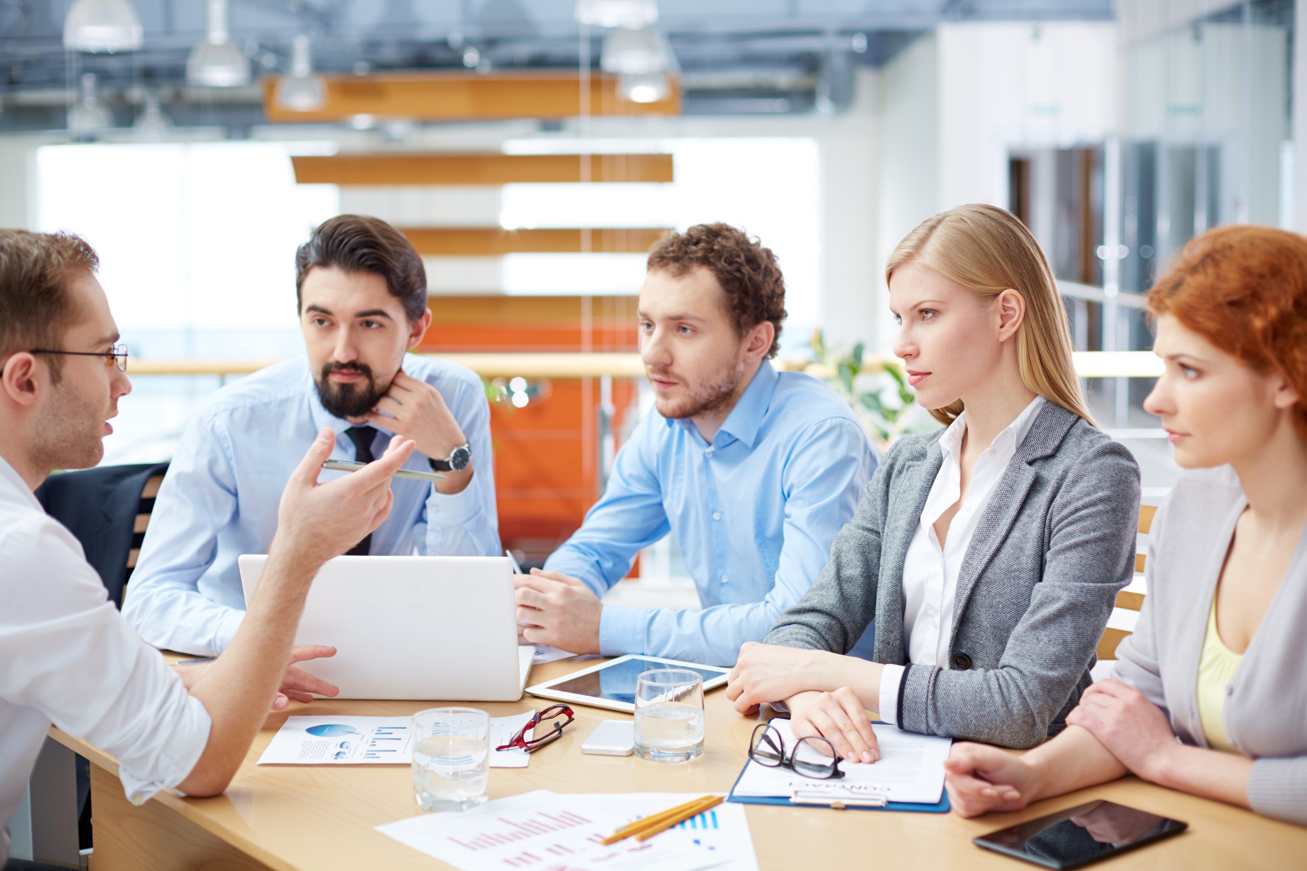 5 people in business meeting