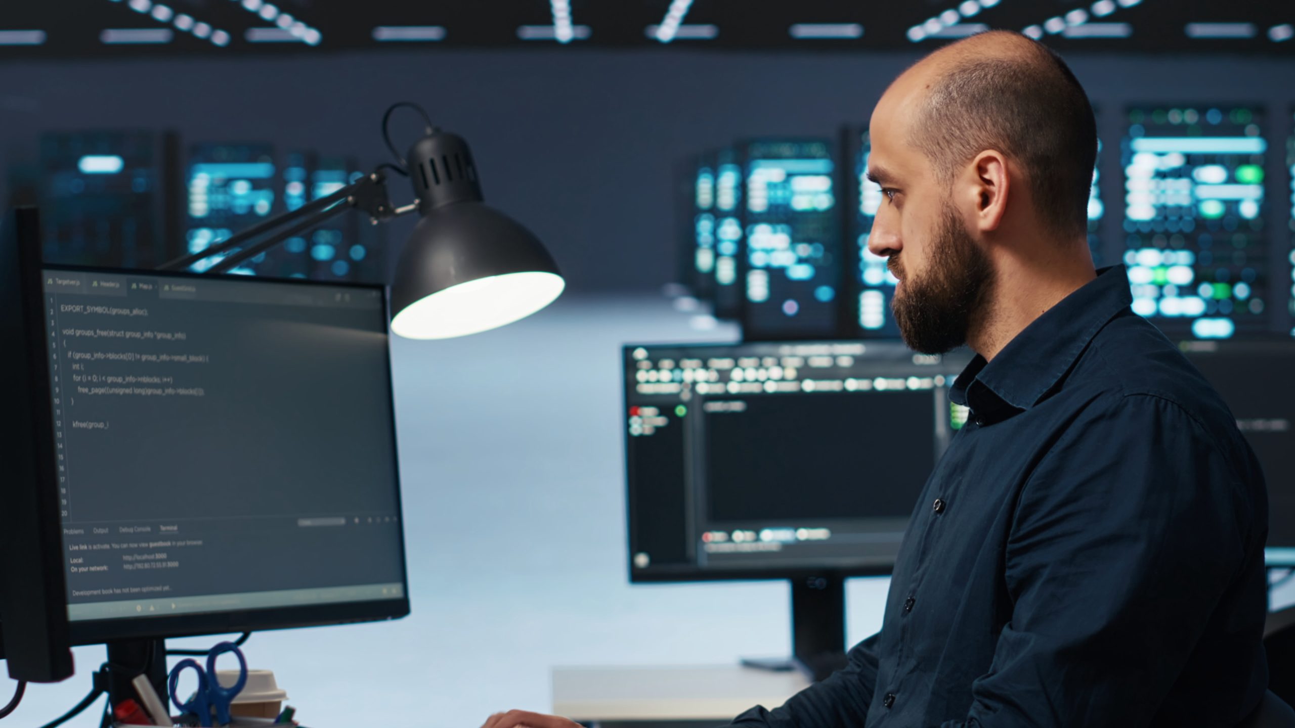 Engineer programming on computer