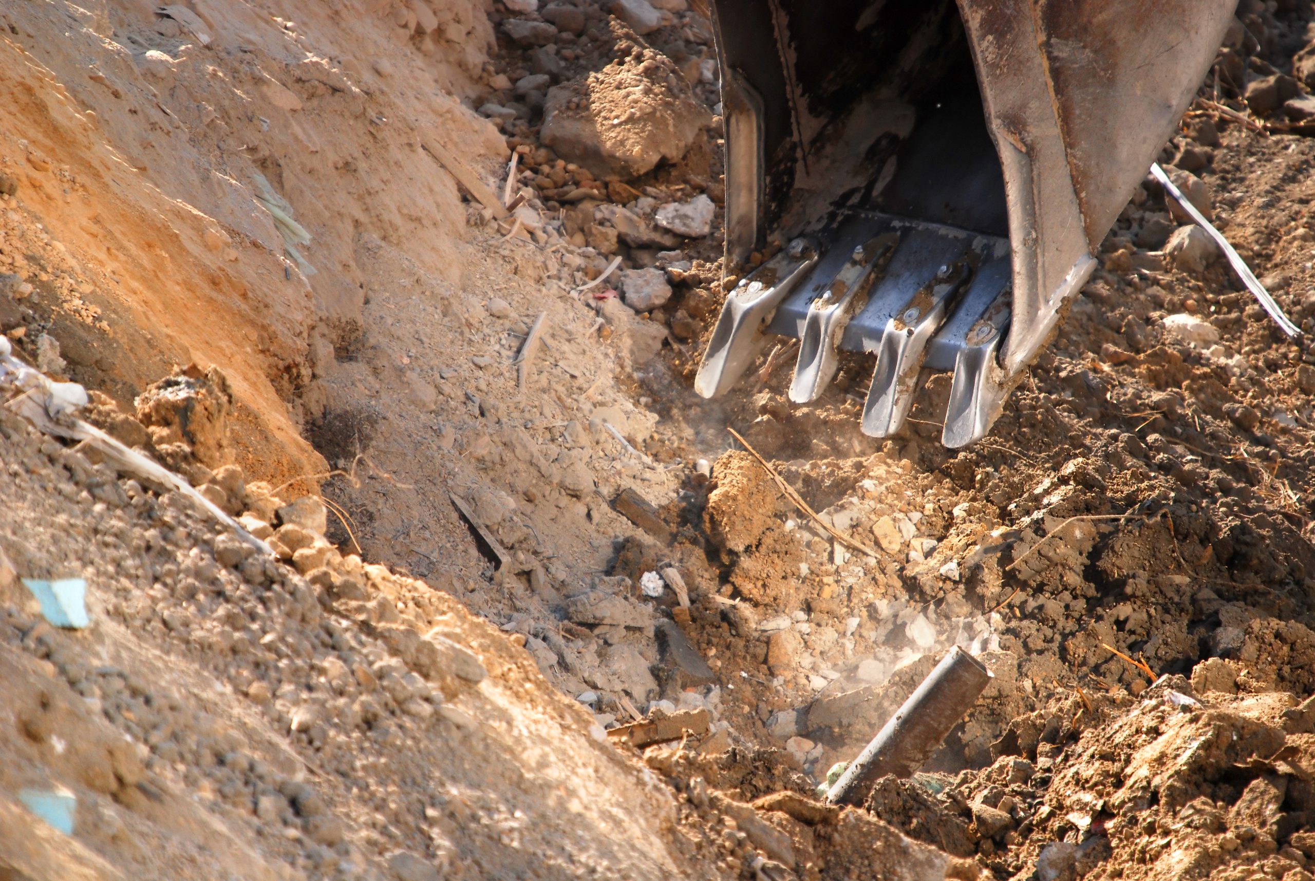 bulldozer digging a hole
