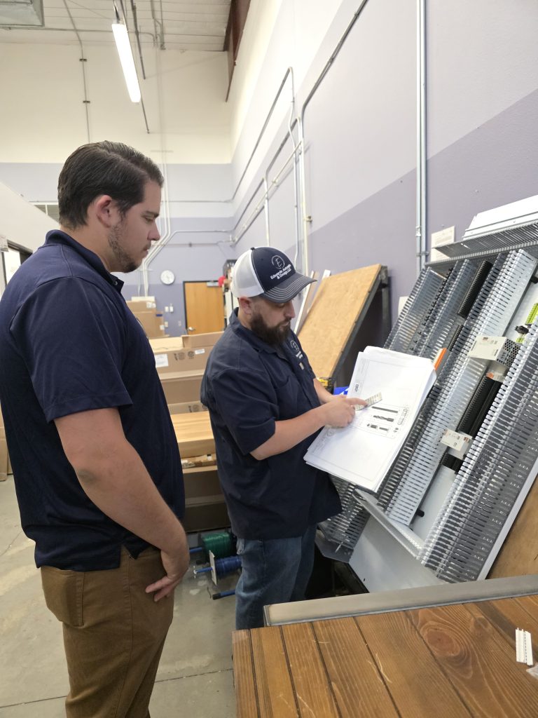Engineers doing a panel check