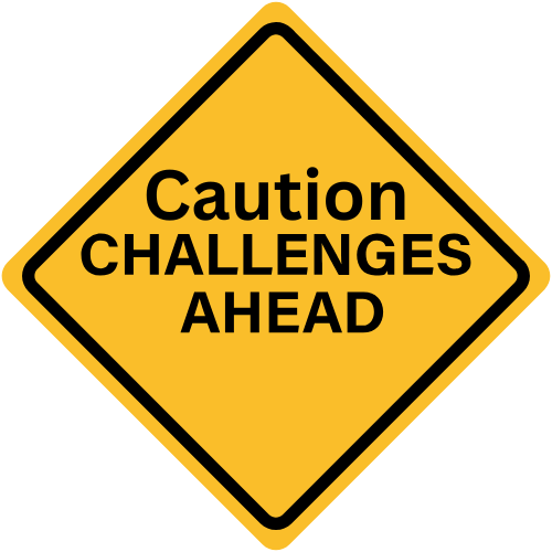 Traffic signage that reads Caution Challenges ahead